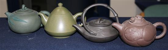 Four Yixing pottery teapots